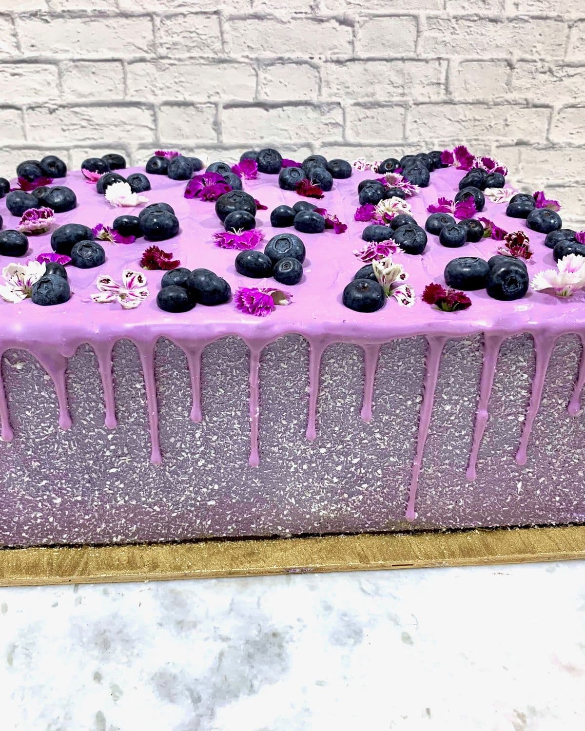 Blueberry and violet drip on a lo…
